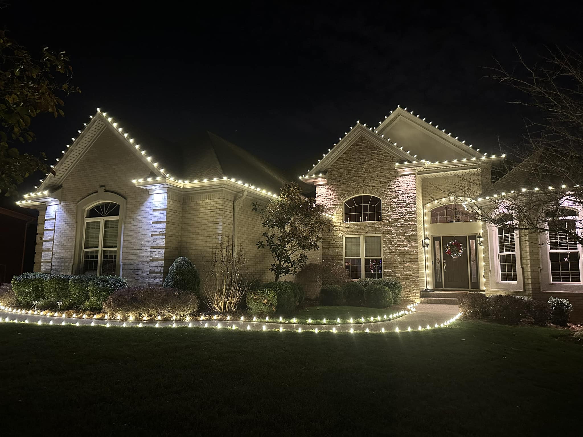 Classic Christmas light package — warm-white roofline with pathway lights