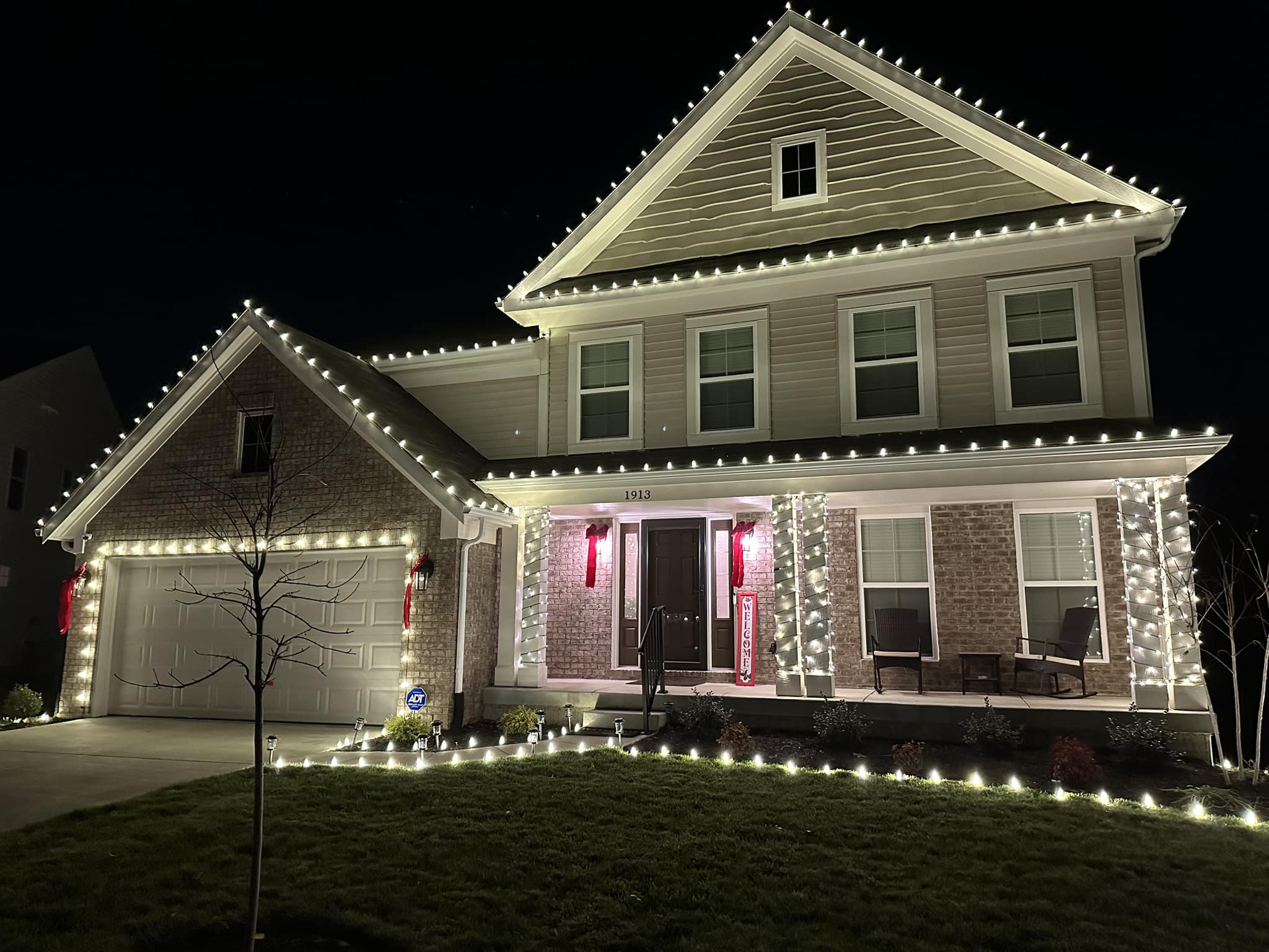 Premium Christmas light package — full roofline, pillar wraps, bushes and pathway